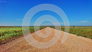 Landscape and road of national park Zona de Interes Regional Llanos de Caceres y Sierra de Fuentes in Extremadura, Spain photo