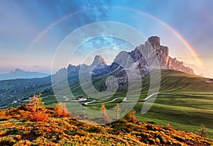 Landscape nature mountan in Alps with rainbow photo