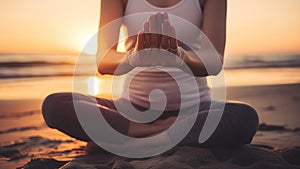 Hand of woman practicing meditation yoga on nature sunset