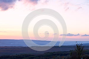 Landscape of Negresti village at purple sunset in Moldova