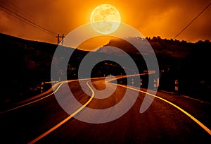 Landscape of nighttime with curvy roadway in forest at national