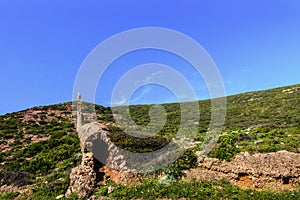 Landscape with nuraghic building / battlements in southeast Sardinia, Italy photo