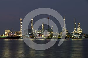 Landscape of oil refinery industry with oil storage tank in nigh
