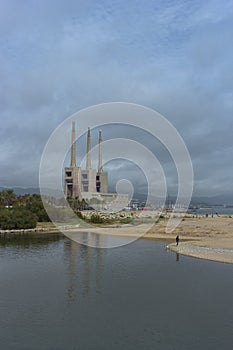 Landscape with an old disused thermal power station for the production of electric energy