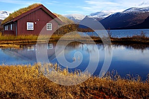 Landscape with old house and lake