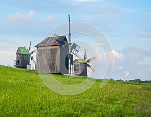 Landscape with old rural windmills in the countryside.