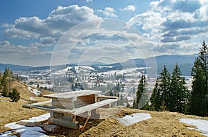 Landscape with old rural wooden table in countryside