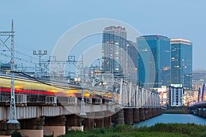 Landscape of osaka city at Umeda from across the Yodogawa River photo