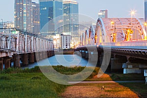 Landscape of osaka city at Umeda from across the Yodogawa River photo