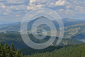 Landscape of the Ousor Peak and Rodnei Mountains near Vatra Dornei, Romania photo