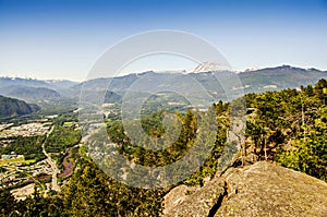 Landscape overlooking the mountains from the top of Chiefs trail in Squamish near Vancouver photo