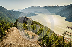 Landscape overlooking the sea and mountains from Chiefs trail peak, Vancouver BC photo