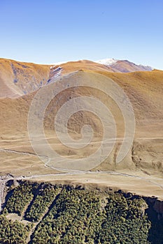 Landscape panorama caucasus mountain with autumn hills