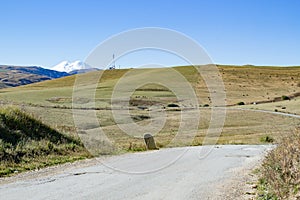 Landscape panorama Elbrus mountain with autumn hills