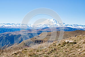 Landscape panorama Elbrus mountain with autumn hills