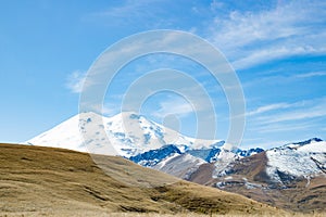 Landscape panorama Elbrus mountain with autumn hills