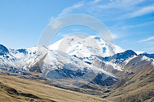 Landscape panorama Elbrus mountain with autumn hills