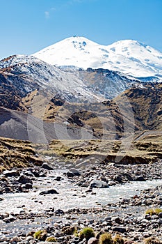 Landscape panorama Elbrus mountain with autumn hills