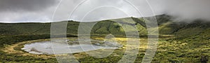 Landscape panorama at Lagoa Branca caldera crater lake on the Azores island of Ilha das Flores