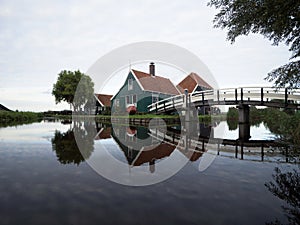 Landscape panorama of typical traditional house in Zaanse Schans river canal Zaandijk Amsterdam Holland Netherlands