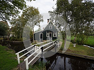 Landscape panorama of typical traditional house in Zaanse Schans river canal Zaandijk Amsterdam Holland Netherlands