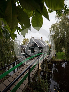 Landscape panorama of typical traditional house in Zaanse Schans river canal Zaandijk Amsterdam Holland Netherlands