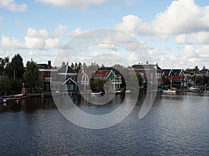 Landscape panorama of typical traditional house in Zaanse Schans river canal Zaandijk Amsterdam Holland Netherlands