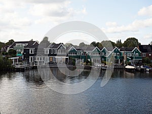 Landscape panorama of typical traditional houses in Zaanse Schans river canal Zaandijk Amsterdam Holland Netherlands