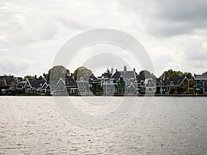 Landscape panorama of typical traditional houses in Zaanse Schans river canal Zaandijk Amsterdam Holland Netherlands