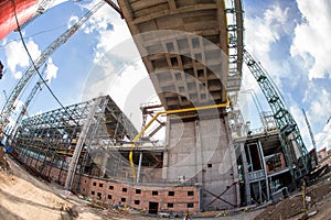 Landscape, panorama, view of factory slums with metal hulls and machines for the production of the coking industry,