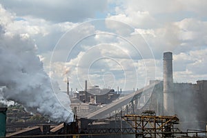 Landscape, panorama, view of factory slums with metal hulls and machines for the production of the coking industry,