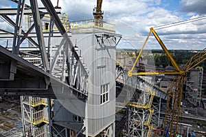 Landscape, panorama, view of factory slums with metal hulls and machines for the production of the coking industry,