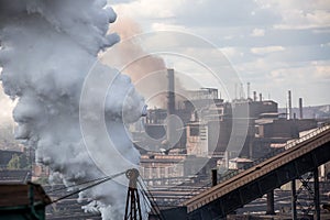 Landscape, panorama, view of factory slums with metal hulls and machines for the production of the coking industry,