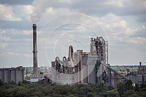 Landscape, panorama, view of factory slums with metal hulls and machines for the production of the coking industry,