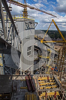 Landscape, panorama, view of factory slums with metal hulls and machines for the production of the coking industry,