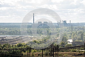 Landscape, panorama, view of factory slums with metal hulls and machines for the production of the coking industry,