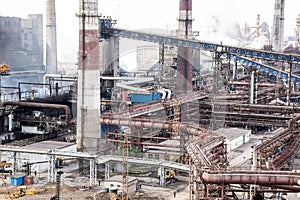 Landscape, panorama, view of factory slums with metal hulls and machines for the production of the coking industry,