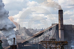 Landscape, panorama, view of factory slums with metal hulls and machines for the production of the coking industry,