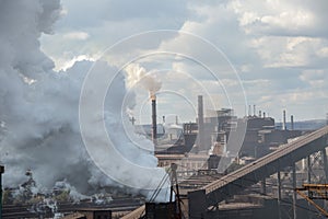 Landscape, panorama, view of factory slums with metal hulls and machines for the production of the coking industry,