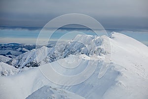 Landscape panoramic view of snowed winter tatra mountains