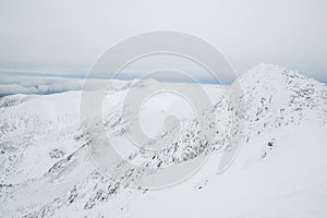 Landscape panoramic view of snowed winter tatra mountains