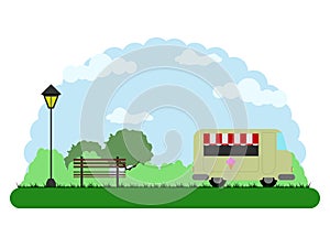 Landscape of a park with a food truck photo
