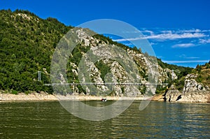 Landscape with pedestrian bridge at river Uvac gorge