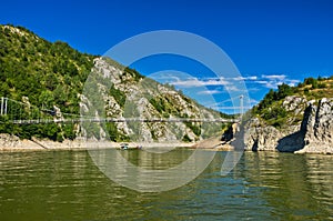 Landscape with pedestrian bridge at river Uvac gorge