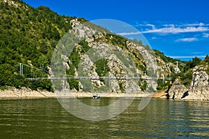 Landscape with pedestrian bridge at river Uvac gorge