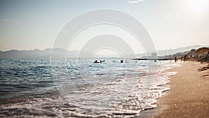 Landscape photo of Cannes Beach, France at sunset time.