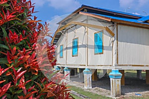 Landscape photo wooden traditional  house in the woods at indonesian or singapore