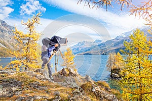 Landscape photographer with old vintage plate camera