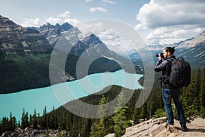 Landscape Photographer at Peyto Lake in Banff National Park, Alberta, Canada