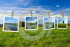 Landscape photographs hanging on a clothesline